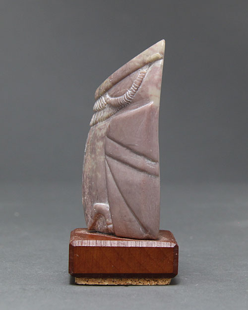 A larger photo of a side view of Soapstone Owl #8 by Clarence