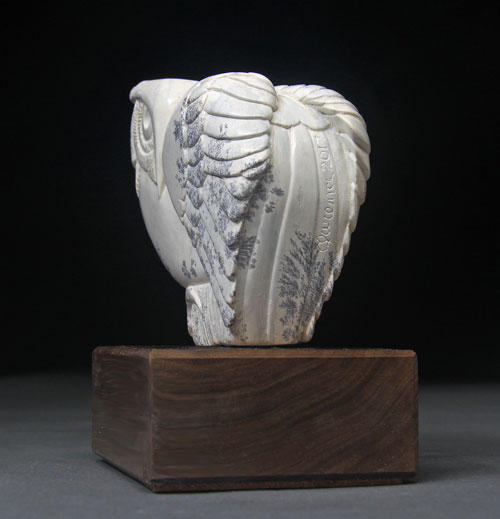 A photo of a side view of Soapstone Owl #30