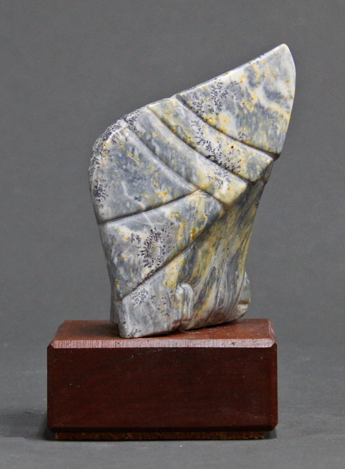 A view of the side of Soapstone Owl #10F
