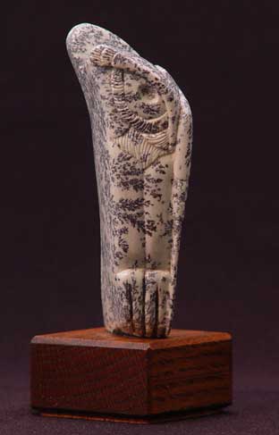 A side view of Soapstone Owl #23