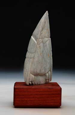 A photo of Soapstone Owl #1L. It is carved in Montana dendritic soapstone by Clarence P. Cameron of Madison, Wisconsin
