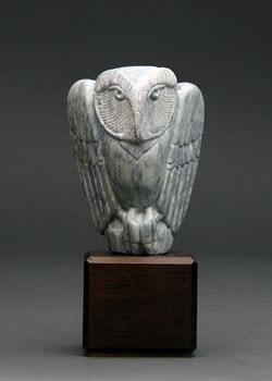 A photo of Soapstone Owl #17F, a fine example of dendritic soapstone. This is Soapstone Owl #17F by Clarence P. Cameron