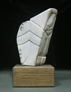 A photo of Soapstone Owl #2F. It is carved in Montana dendritic soapstone by Clarence P. Cameron of Madison, Wisconsin