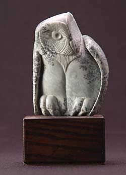 A SOLD soapstone owl