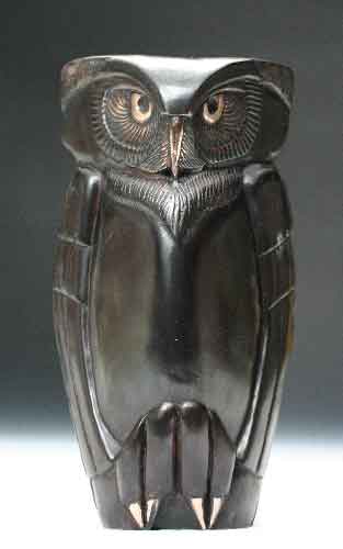 A frontal view of the limited edition bronze owl, Vigilance, by Clarence Cameron. It has a dark brown patina with highlights.