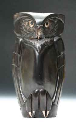 Vigilance, a bronze owl with a dark brown patina, weighted and free-standing.