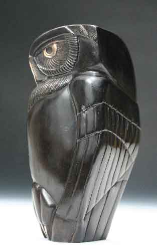 A side view of the limited edition bronze owl, Vigilance, by Clarence Cameron