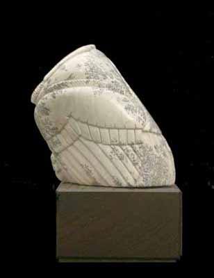 A side view of Soapstone Owl #23C by Clarence P. Cameron of Madison, Wisconsin