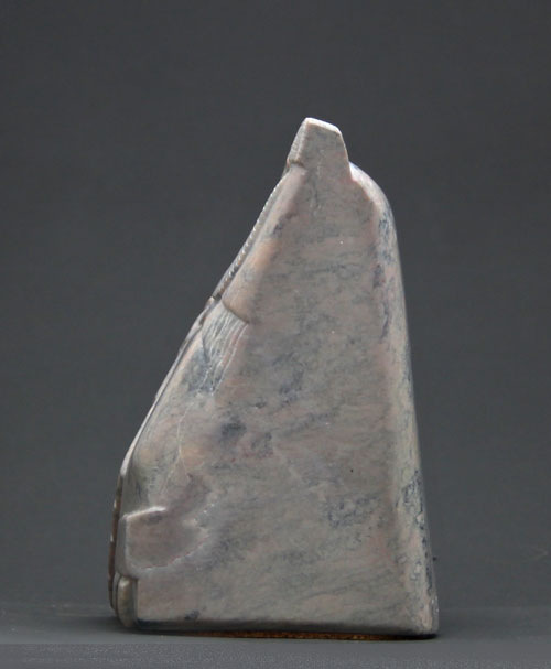 A view of the extended wing of Soapstone Owl #14