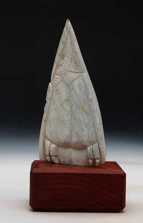 A side view of Soapstone Owl #1L
