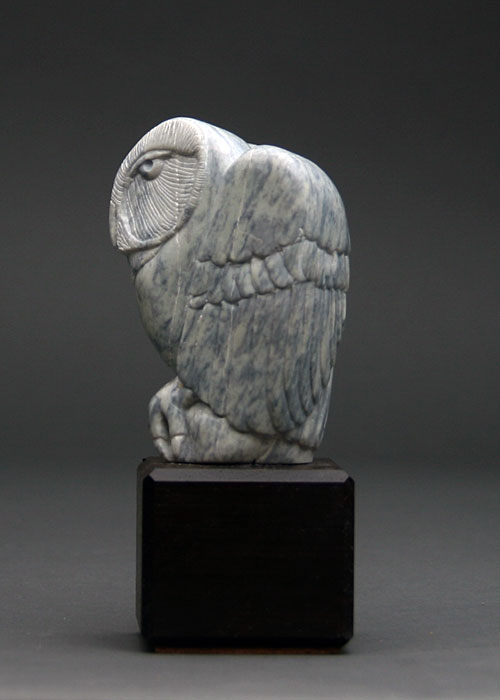 A side view of Soapstone Owl #17F by Clarence