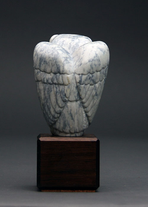 A view of the back of dendritic Soapstone Owl #17F by Clarence P. Cameron of Madison, Wisconsin