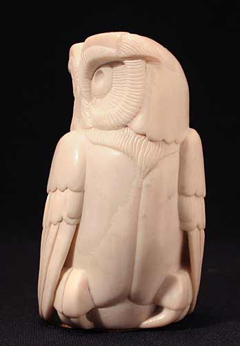 A side view of Soapstone Owl #2F