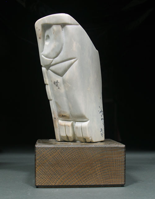 A side view of Soapstone Owl #2F